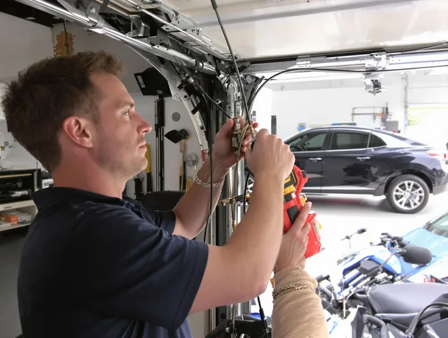 Temescal Valley Garage Door Repair safety certified technician performing cable replacement in Temescal Valley
