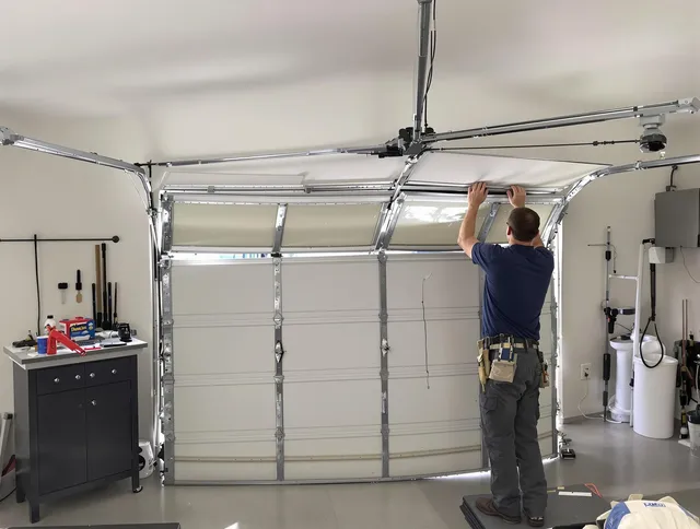 Temescal Valley Garage Door Repair specialist performing precise section replacement on Temescal Valley garage door