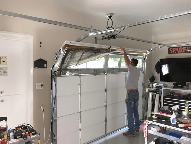 Garage door section replacement by Temescal Valley Garage Door Repair in Temescal Valley